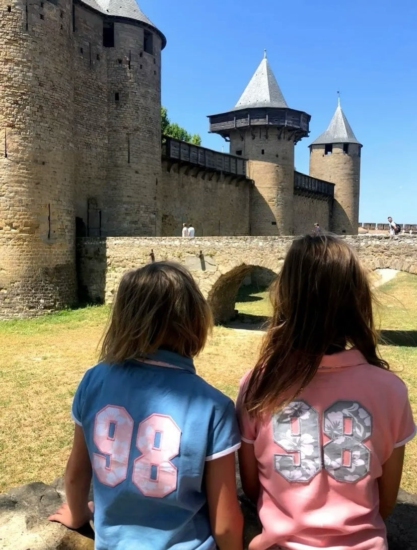 Polo mixte “98” hibiscus – 3 à 10 ans