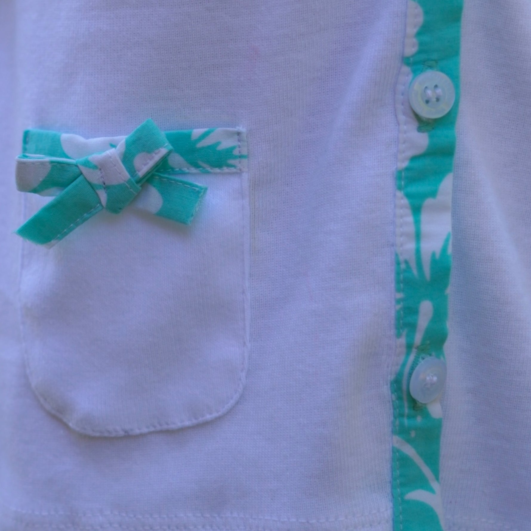 Photo du produit : Gillet fille liseré hibiscus