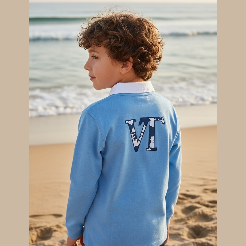 Polo VT garçon manches longues col blanc et boutonnière tissu imprimé hibiscus