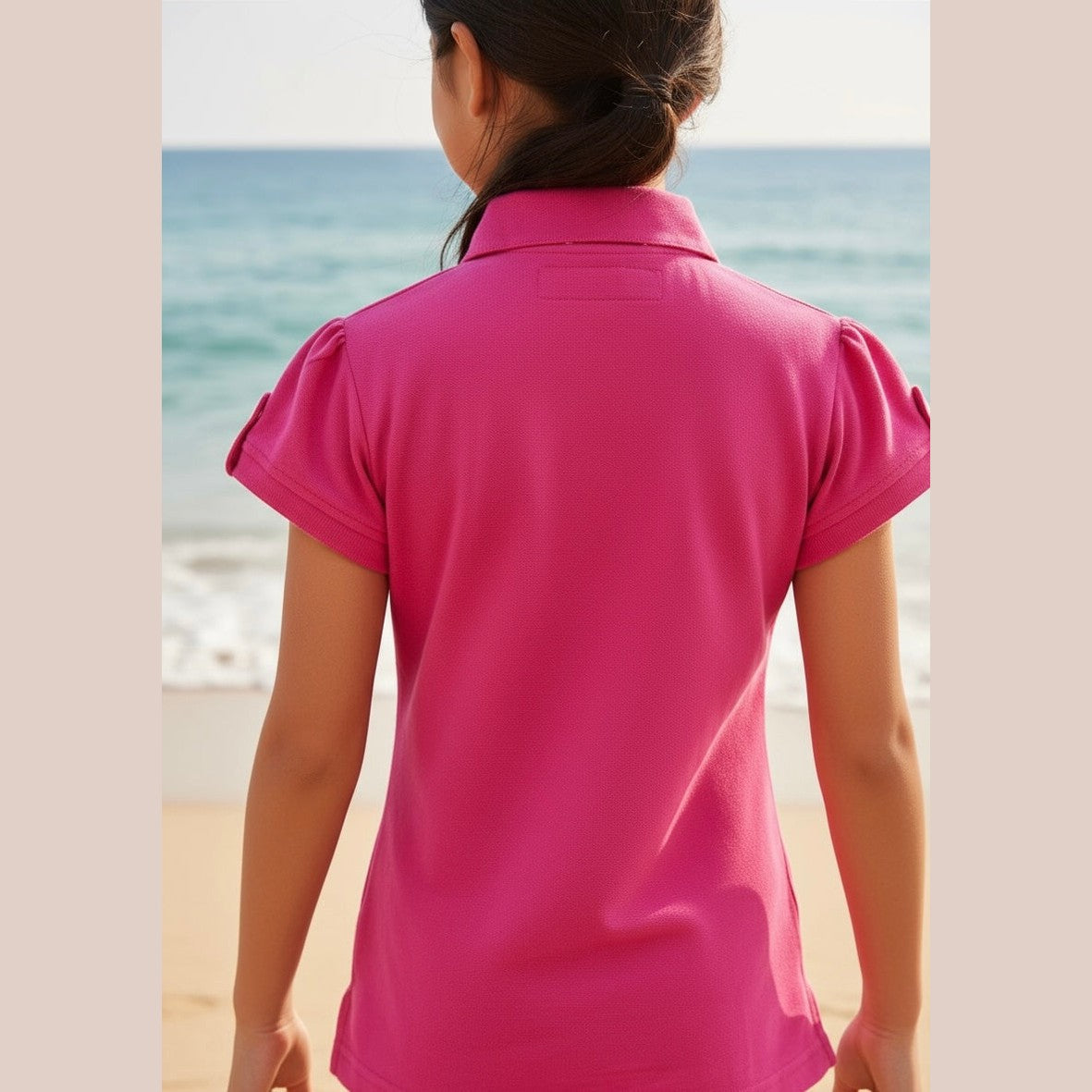 Polo fille col imprimé hibiscus