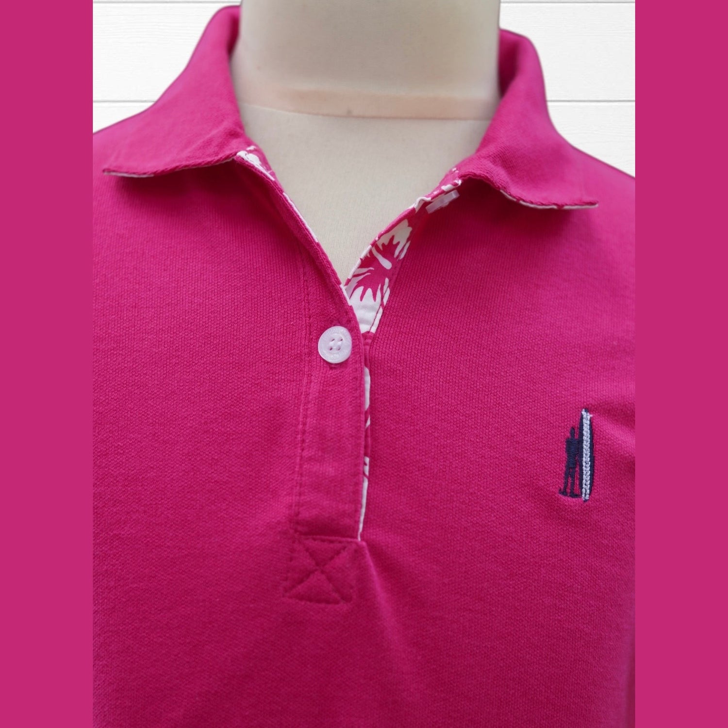 Polo fille col imprimé hibiscus