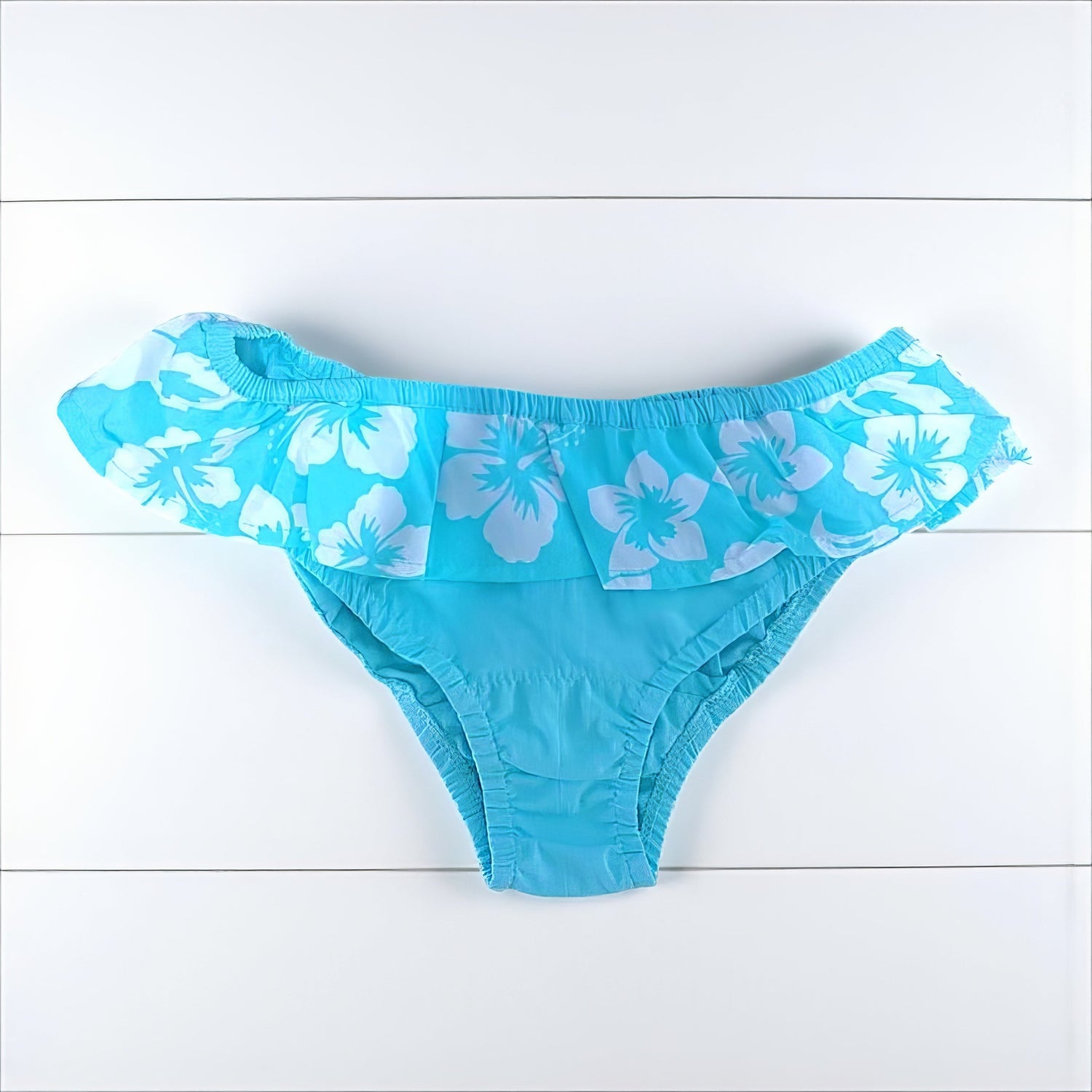 Maillot de bain fillette tissu imprimé hibiscus avec volant