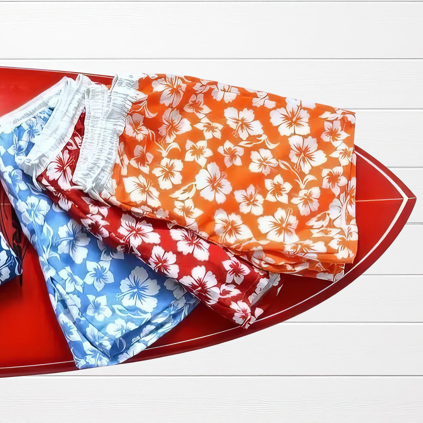 Men's short swim briefs with hibiscus print.